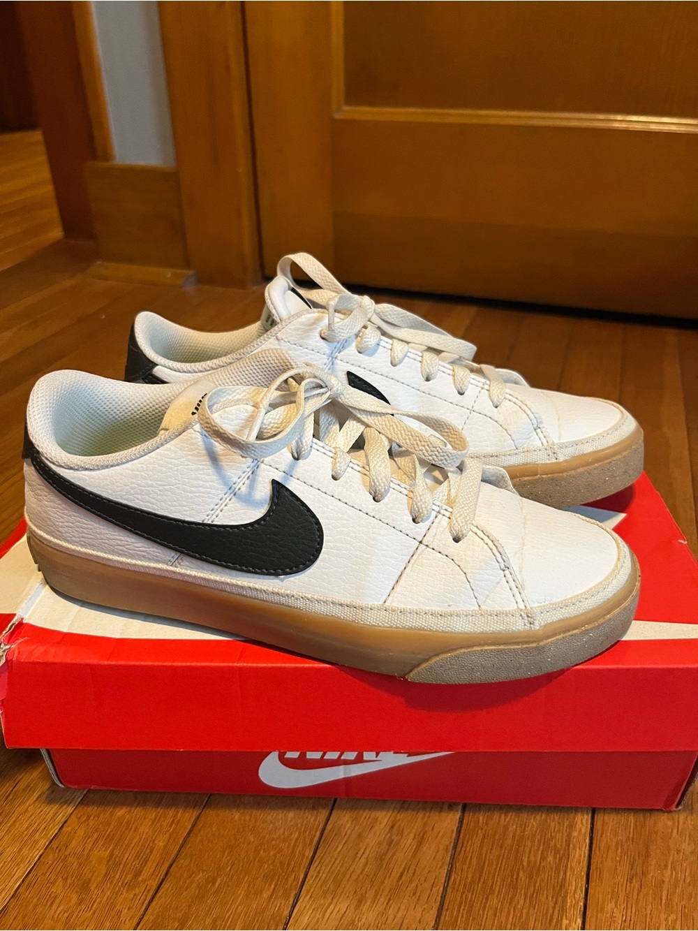 Nike Men’s White Sneakers with Black Swoosh and Gum Sole